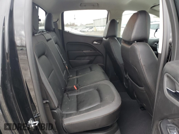 2022 GMC Canyon 4WD AT4 w/Leather with VIN 1GTG6FEN5N1279158, listed as a Copart auction lot 50958545 with 34,569 mi miles and Salvage Title. Bid and sale history available at carsss.com. Image 10.