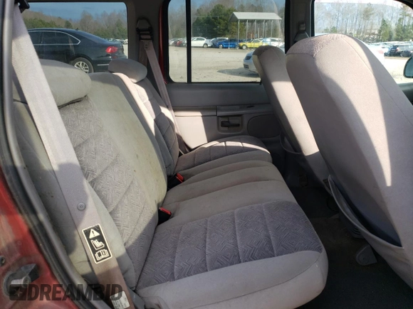 1999 Ford Explorer XLT с VIN 1FMZU34E5XUB92873, выставлен на аукционе Copart как лот 86447064 с пробегом 237 264 миль миль и Списание • Salvage title. История ставок и продаж доступна на DreamBid. Изображение 11.
