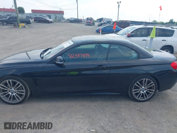 2015 BMW 4 Series 428i z VIN WBA3V5C59FP752716, wystawiony jako IAAI lot #42397899 z przebiegiem 73 122 mil mil oraz . Historia ofert i sprzedaży dostępna na DreamBid. Obrazek 14.