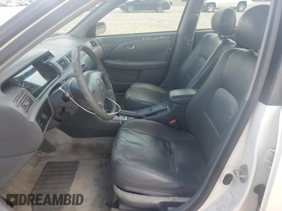 2001 Toyota Camry LE z VIN JT2BF22K310305858, wystawiony jako Copart lot #55231305 z przebiegiem 149 104 mil mil oraz Nie do naprawy • Non repairable. Historia ofert i sprzedaży dostępna na DreamBid. Obrazek 7.