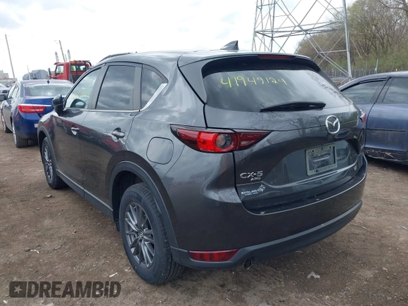 2020 Mazda CX-5 Touring with VIN JM3KFBCM1L0792396, listed as a IAAI auction lot 41949124 with 118,280 mi miles. Bid and sale history available at carsss.com. Image 3.