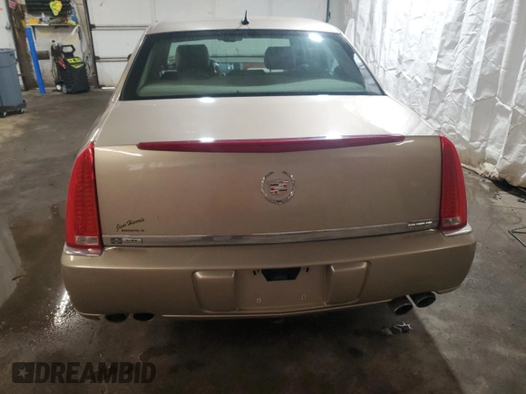 2006 Cadillac DTS 1SC z VIN 1G6KD57Y76U141402, wystawiony jako Copart lot #58715675 z przebiegiem 148 042 mil mil oraz Szkoda całkowita • Salvage title. Historia ofert i sprzedaży dostępna na DreamBid. Obrazek 6.