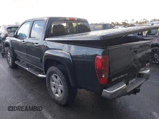 2010 GMC Canyon z VIN 1GTJSFDP6A8134412, wystawiony jako IAAI lot #41589150 z przebiegiem 164 232 mil mil oraz . Historia ofert i sprzedaży dostępna na DreamBid. Obrazek 3.