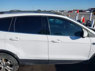 2013 Ford Escape SE with VIN 1FMCU0G9XDUD01410, listed as a IAAI auction lot 41758032 with 154,208 mi miles. Bid and sale history available at carsss.com. Image 13.