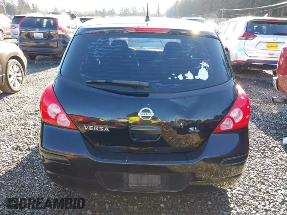 2009 Nissan Versa 1.8 SL with VIN 3N1BC13E59L406937, listed as a IAAI auction lot 41387158 with 149,234 mi miles. Bid and sale history available at carsss.com. Image 16.