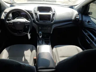 2018 Ford Escape S with VIN 1FMCU0F7XJUA28402, listed as a Copart auction lot 57955745 with 104,625 mi miles and Salvage title. Bid and sale history available at DreamBid. Image 8.