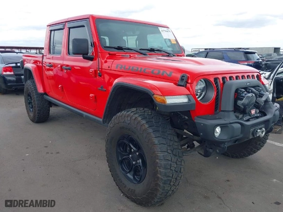 2021 Jeep Gladiator Rubicon with VIN 1C6JJTBG8ML561779, listed as a IAAI auction lot 41796879 with 59,822 mi miles. Bid and sale history available at carsss.com. Image 1.