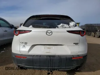 2021 Mazda CX-30 Premium with VIN 3MVDMBDY4MM308677, listed as a Copart auction lot 81869044 with 32,362 mi miles and Salvage Title. Bid and sale history available at carsss.com. Image 6.