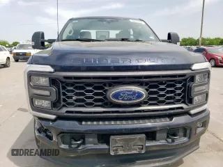 2023 Ford F-250 XL z VIN 1FT8W2BT8PED58853, wystawiony jako Copart lot #52819335 z przebiegiem 107 892 mil mil oraz Szkody całkowita. Historia ofert i sprzedaży dostępna na DreamBid. Obrazek 5.