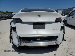 2023 Tesla Model Y Long Range with VIN 7SAYGDEEXPF770800, listed as a Copart auction lot 48324515 with 25,205 mi miles and Salvage Title. Bid and sale history available at DreamBid. Image 6.
