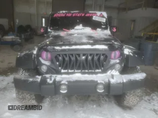 2016 Jeep Wrangler Unlimited Rubicon z VIN 1C4HJWFGXGL211657, wystawiony jako Copart lot #45135355 z przebiegiem 97 046 mil mil oraz Szkoda całkowita • Salvage title. Historia ofert i sprzedaży dostępna na DreamBid. Obrazek 5.