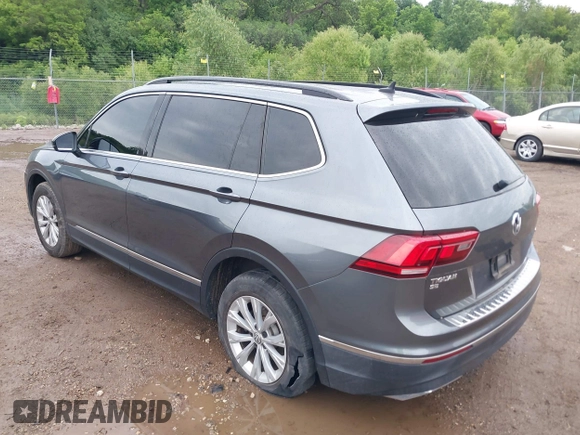 2018 Volkswagen Tiguan SEL with VIN 3VV2B7AX1JM166258, listed as a IAAI auction lot 42559513 with 36,246 mi miles and . Bid and sale history available at DreamBid. Image 3.