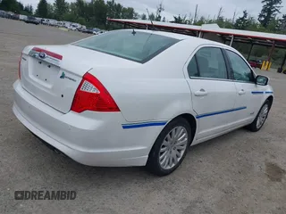 2011 Ford Fusion Hybrid z VIN 3FADP0L34BR202769, wystawiony jako IAAI lot #42504494 z przebiegiem 33 902 mil mil oraz . Historia ofert i sprzedaży dostępna na DreamBid. Obrazek 4.