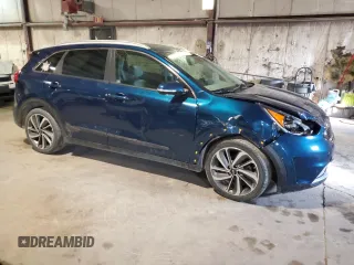 2019 Kia Niro Touring with VIN KNDCE3LC3K5233334, listed as a Copart auction lot 50331415 with 121,827 mi miles and Salvage Title. Bid and sale history available at carsss.com. Image 4.