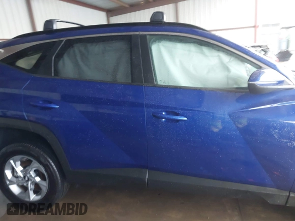 2023 Hyundai Tucson SEL with VIN 5NMJBCAE1PH293069, listed as a IAAI auction lot 41551241 with 18,819 mi miles. Bid and sale history available at carsss.com. Image 14.