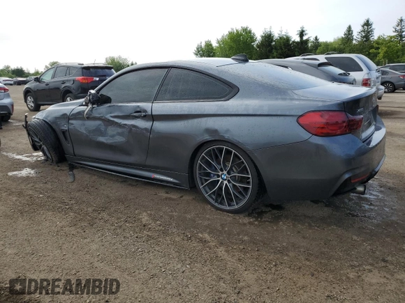 2014 BMW 4 Series 435i xDrive with VIN WBA3R5C57EF784623, listed as a Copart auction lot 58394765 with 206,251 mi miles and Clean title. Bid and sale history available at DreamBid. Image 2.