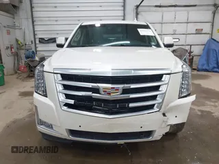 2015 Cadillac Escalade Luxury z VIN 1GYS4MKJ0FR566796, wystawiony jako IAAI lot #42044792 z przebiegiem 176 162 mil mil oraz . Historia ofert i sprzedaży dostępna na DreamBid. Obrazek 12.