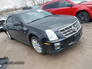 2010 Cadillac STS AWD with VIN 1G6DU6EV1A0101565, listed as a IAAI auction lot 41846364 with 145,980 mi miles and . Bid and sale history available at carsss.com. Image 1.