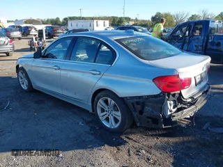2017 BMW 3 Series 330i with VIN WBA8B9G30HNU57209, listed as a IAAI auction lot 40523376 with 94,338 mi miles. Bid and sale history available at carsss.com. Image 3.
