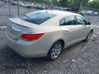 2012 Buick LaCrosse Premium 3 with VIN 1G4GH5E39CF295765, listed as a IAAI auction lot 42468860 with 121,070 mi miles and . Bid and sale history available at DreamBid. Image 4.