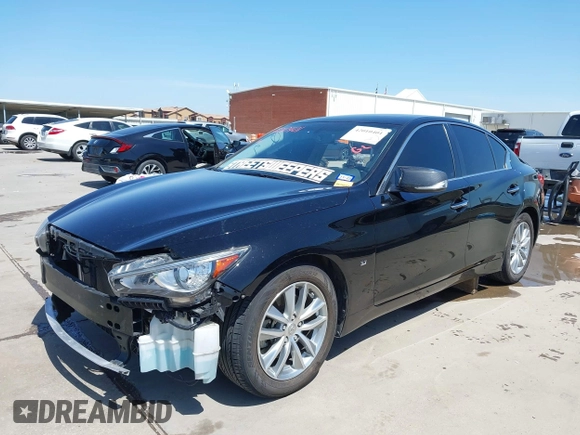 2015 Infiniti Q50 Premium with VIN JN1BV7AP9FM355526, listed as a IAAI auction lot 42010401 with 67,131 mi miles. Bid and sale history available at carsss.com. Image 2.