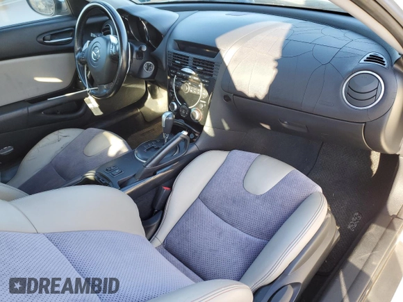 2006 Mazda RX-8 z VIN JM1FE173260205586, wystawiony jako Copart lot #87286304 z przebiegiem 73 257 mil mil oraz Czysty tytuł • Clean title. Historia ofert i sprzedaży dostępna na DreamBid. Obrazek 8.