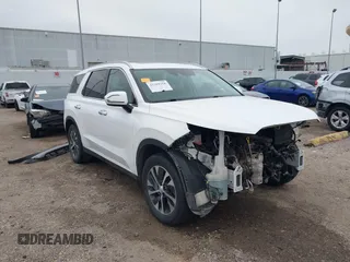 2021 Hyundai Palisade SEL z VIN KM8R24HE1MU281373, wystawiony jako IAAI lot #41301658 z przebiegiem 79 004 mil mil oraz . Historia ofert i sprzedaży dostępna na DreamBid. Obrazek 1.