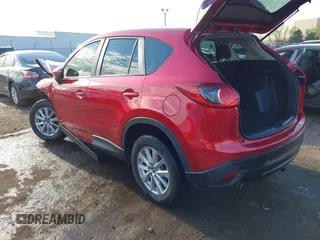 2015 Mazda CX-5 Sport z VIN JM3KE2BE7F0516869, wystawiony jako IAAI lot #41866488 z przebiegiem 131 237 mil mil oraz . Historia ofert i sprzedaży dostępna na DreamBid. Obrazek 3.