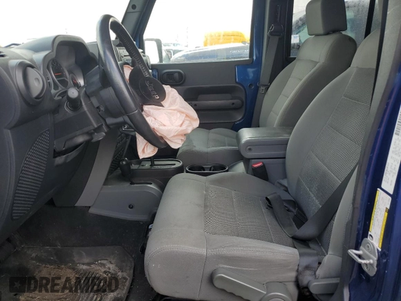 2009 Jeep Wrangler Unlimited Rubicon with VIN 1J4GA69199L713060, listed as a Copart auction lot 58543595 with 159,981 mi miles and Clean title. Bid and sale history available at DreamBid. Image 7.