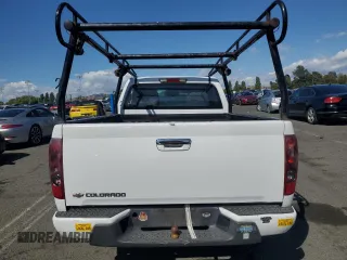 2012 Chevrolet Colorado Work Truck with VIN 1GCCSBF9XC8145058, listed as a Copart auction lot 57133065 with 261,719 mi miles and Salvage title. Bid and sale history available at DreamBid. Image 6.