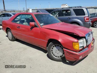 1990 Mercedes-Benz 300 CE with VIN WDBEA51D7LB137591, listed as a Copart auction lot 49811234 with 23,385 mi miles and Salvage Title. Bid and sale history available at carsss.com. Image 4.