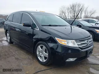 2012 Honda Odyssey Touring with VIN 5FNRL5H92CB118720, listed as a IAAI auction lot 42003003 with 93,284 mi miles. Bid and sale history available at carsss.com. Image 1.