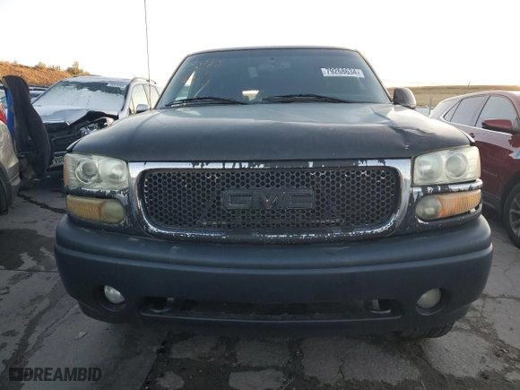 2001 GMC Yukon Denali with VIN 1GKEK63U51J184935, listed as a Copart auction lot 79268634 with 320,366 mi miles and Salvage Title. Bid and sale history available at carsss.com. Image 5.