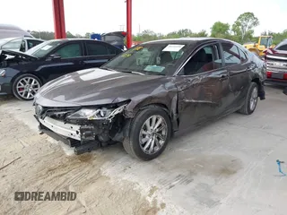 2023 Toyota Camry LE z VIN 4T1C11AK3PU719452, wystawiony jako IAAI lot #38236100 z przebiegiem 34 140 mil mil oraz . Historia ofert i sprzedaży dostępna na DreamBid. Obrazek 2.