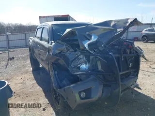 2015 Toyota Tacoma with VIN 5TFLU4ENXFX139145, listed as a IAAI auction lot 41822079 with 146,842 mi miles. Bid and sale history available at carsss.com. Image 1.
