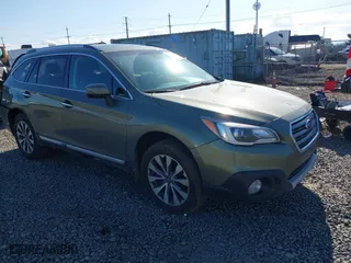 2017 Subaru Outback Touring with VIN 4S4BSETC4H3216381, listed as a IAAI auction lot 41752855 with 64,236 mi miles. Bid and sale history available at carsss.com. Image 1.