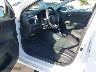 2023 Kia Rio S with VIN 3KPA24AD4PE573279, listed as a IAAI auction lot 41885298 with 11,561 mi miles. Bid and sale history available at carsss.com. Image 18.