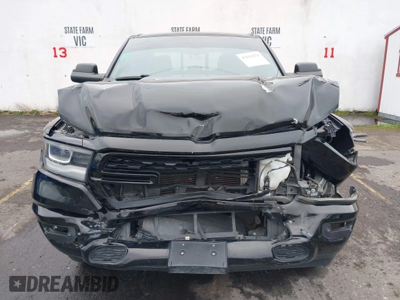 2019 Ram 1500 Big Horn/Lone Star with VIN 1C6SRFFT9KN625013, listed as a IAAI auction lot 41611276 with 100,463 mi miles. Bid and sale history available at carsss.com. Image 13.