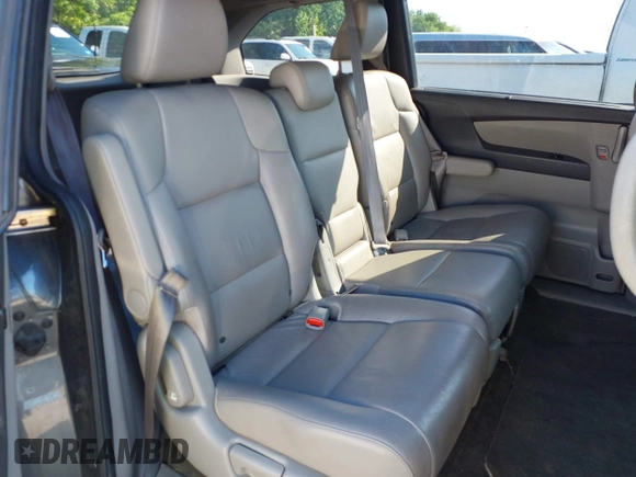 2011 Honda Odyssey EX-L with VIN 5FNRL5H6XBB073482, listed as a IAAI auction lot 42090463 with 213,061 mi miles and . Bid and sale history available at carsss.com. Image 8.