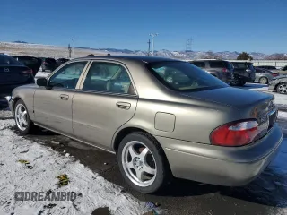 2001 Mazda 626 LX with VIN 1YVGF22C315225141, listed as a Copart auction lot 42004475 with 195,643 mi miles and Salvage Title. Bid and sale history available at carsss.com. Image 2.