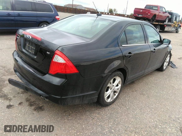 2012 Ford Fusion SE with VIN 3FAHP0HA4CR413738, listed as a IAAI auction lot 41957955 with 79,684 mi miles and . Bid and sale history available at DreamBid. Image 4.