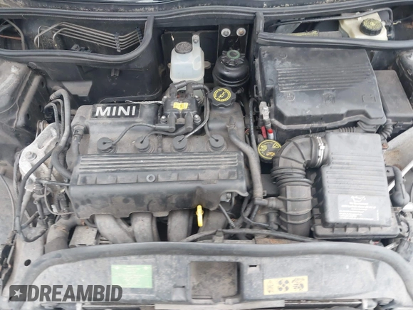 2005 MINI Hardtop with VIN WMWRC33535TJ70850, listed as a IAAI auction lot 42219720 with 66,398 mi miles and . Bid and sale history available at DreamBid. Image 10.