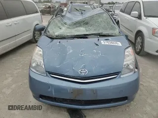 2007 Toyota Prius z VIN JTDKB20U977690141, wystawiony jako Copart lot #57838035 z przebiegiem Nie podano mil oraz Szkoda całkowita • Salvage title. Historia ofert i sprzedaży dostępna na DreamBid. Obrazek 13.