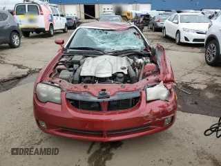 2004 Chrysler Crossfire z VIN 1C3AN69L54X005704, wystawiony jako Copart lot #58487215 z przebiegiem 120 423 mil mil oraz Czysty tytuł • Clean title. Historia ofert i sprzedaży dostępna na DreamBid. Obrazek 5.
