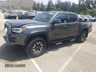 2023 Toyota Tacoma SR with VIN 3TMCZ5AN9PM573092, listed as a Copart auction lot 59556655 with 38,052 mi miles and Salvage title. Bid and sale history available at DreamBid. Image 1.
