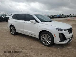 2021 Cadillac XT6 Premium Luxury with VIN 1GYKPCRSXMZ169206, listed as a Copart auction lot 55953525 with 64,789 mi miles and Salvage Title. Bid and sale history available at DreamBid. Image 4.