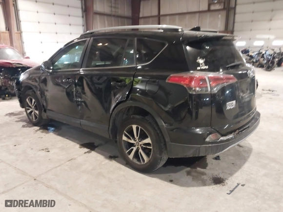 2017 Toyota RAV4 XLE with VIN 2T3RFREV0HW669312, listed as a IAAI auction lot 41410721 with 99,404 mi miles. Bid and sale history available at carsss.com. Image 3.