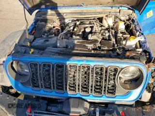 2024 Jeep Wrangler Rubicon z VIN 1C4PJXCG1RW298288, wystawiony jako Copart lot #81371914 z przebiegiem 4 445 mil mil oraz Szkoda całkowita • Salvage title. Historia ofert i sprzedaży dostępna na DreamBid. Obrazek 13.