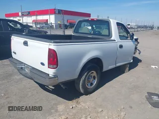 2002 Ford F-150 XL with VIN 1FTRF172X2NC07830, listed as a IAAI auction lot 41584706 with 143,255 mi miles. Bid and sale history available at carsss.com. Image 4.