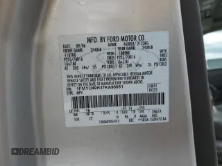 2007 Ford Escape Hybrid with VIN 1FMYU49H37KA96661, listed as a Copart auction lot 51013435 with 141,484 mi miles and Salvage Title. Bid and sale history available at carsss.com. Image 13.